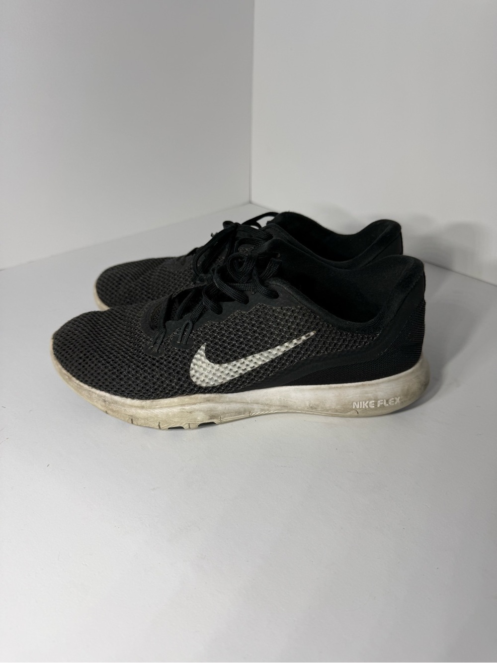 Nike Women’s Black Athletic Running Shoes with White Swoosh